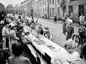 PICTURE FROM THE ARCHIVE: A picture from our archives that was originally sent in by Mrs Christine Jones, nee Christine Pemberton, of Market Drayton, who was born in 1944. It is a VE Day party in Station Road, Wem. She said: ‘I am the little girl extreme right bottom with my mum Hilda holding me.’ 