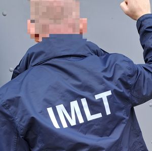 An IMLT officer