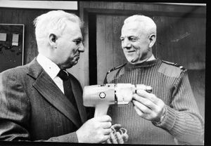 ... . .. .Wilf Mather, of Whitgreave Lane, Great Bridgeford, is presented with an electric drill, a gift from colleague, by Air vice-marshal Jimmy Gill, to mark his retirement from RAF Stafford in August 1977. Pictures from the Past are available, at 10x8ins and cost \u00a311.50, Copyright Express & Star. Call 01902 313131.. sep9staoldpic | 07 Sep 2016 MS ssep8staoldpic