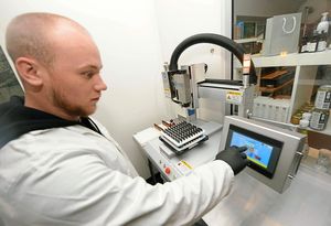 Dean Burke using a CBD Pod Filler at CBD Virtue