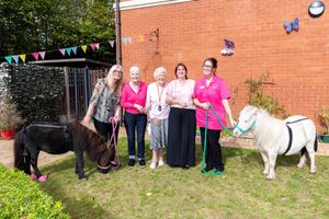 Both staff and residents at the home loved the four legged duo