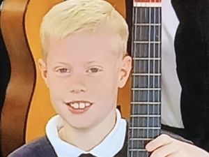 Supporting image for story: School hall 'packed' to see children entertain with live music show