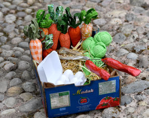 The pictured carrots and secateurs are made of paper