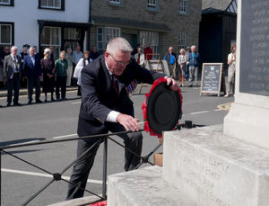 Veteran Brian MacKenzie lays a wreath on behalf of the Royal British Legion at the VE Day 80 service on Sunday. Image: Andy Compton