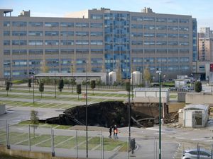 Supporting image for story: Sinkhole swallows cars at Italian hospital treating coronavirus patients