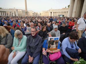 Mourners gather after the death of Pope Francis was announced