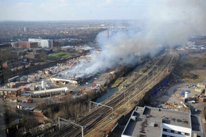 Smoke drifts across railway lines