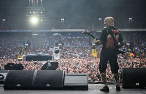 Member of US rock band Anthrax, Scott Ian plays to the crowd as a support act, during British rock band Black Sabbath's "Back to The Beginning" concert, Ozzy Osbourne's final ever gig as Black Sabbath's frontman at Villa Park in Birmingham, central England on July 5, 2025. Osbourne, who revealed in 2020 that he has Parkinson's disease, will join Tony Iommi, Geezer Butler and Bill Ward for the all-day "Back To The Beginning" show in Birmingham, central England, where the heavy metal giants formed in 1968. (Photo by Andy Buchanan / AFP) (Photo by ANDY BUCHANAN/AFP via Getty Images)          