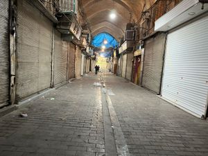 Supporting image for story: Security forces clash with protesters in Iran’s main market