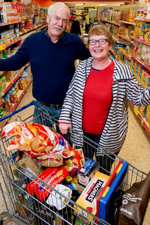 Deri and Leri Roberts from Llanrhaeadr fill up their trolley at Stans Superstore on December 21, 2015, the busiest shopping day of the year