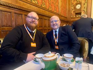 Stephen Ruddick and Alex Long enjoy a cake and coffee in Downing Street