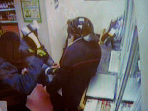 Supporting image for story: CCTV catches axe raiders pouncing on driver