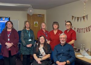 Loriane Priest. of Cradley Heath, celebrates retirement with colleagues. 