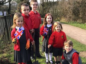 Supporting image for story: Children plant orchard pathway for Queen's Platinum Jubilee