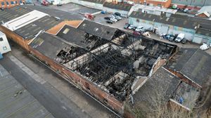 The damaged roof at the gutted commercial unit