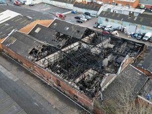 Supporting image for story: Watch: Dramatic drone images of gutted Walsall fireworks storage unit - blaze was tackled by over 50 firefighters