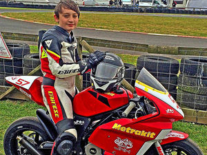 Supporting image for story: Joshua Hiatt battles rain to stay on right track