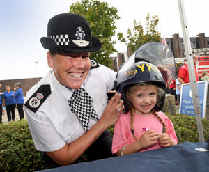Outgoing chief constable Pippa Mills and five-year-old Branwyn Parish