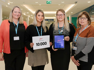 Staff at The Robert Jones and Agnes Hunt Orthopaedic Hospital celebrate 10,000 registered users of the myrecovery app.