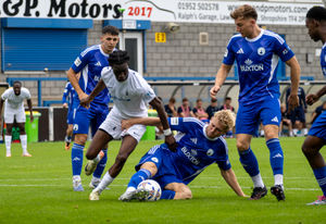 Ola Lawal in the thick of the action for AFC Telford United during Saturday's 1-0 defeat to Buxton (Picture: Jayden Porter)