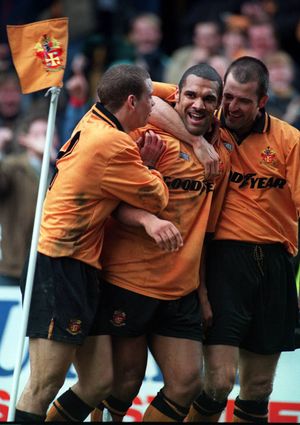 James Smith and Steve Bull congratulate Don Goodman on Wolves first equaliser.