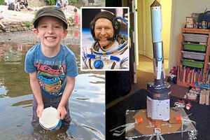 Harry Lanyon, astonaut Tim Peake and Harry's rocket, made from cardboard tubes, tinsel and yoghurt pots