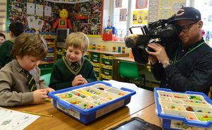 Danish TV crews filming the pupils