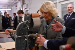 The Duchess of Cornwall during a visit to the factory of the high-end handbag firm Launer