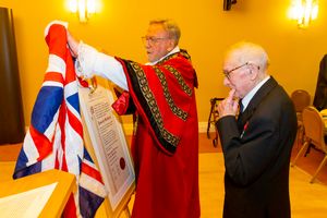 Joe's 'freedom' scroll is unveiled by mayor of Dudley, Councillor Pete Lee