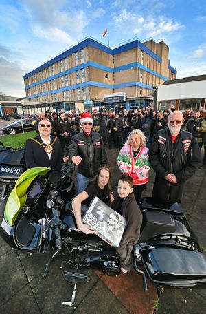Stacey Thirlaway and Carter-Rai Thirlaway from Penn at the front with Mayor Craig Collingswood, Amanda Winwood from the charitable trust at the hospital and chapter founder members: Mr Fun and Big Frank.
