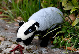 A knitted badger made by a member of the craft group