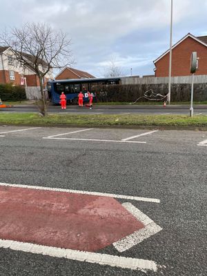 The bus collided with a fence and house. Photo: Dale Norton