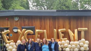 Staff members - Kelly Thompson, Nancy Daly, Sarah Robinson, Estelle Wilcocks, and Rosalind Causer - celebrate their fantastic achievement