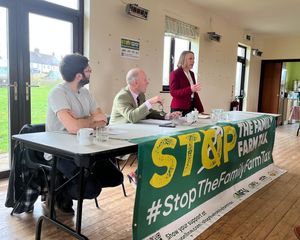 Helen Morgan (right) speaking to farmers from North Shropshire in Hordley. Picture: Helen Morgan MP.