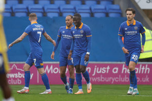 Dan Udoh of Shrewsbury Town celebrates with his team mates after scoring a goal to make it 1-1 (AMA)