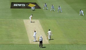 England's James Anderson bowls the first ball of the Ashes to Australia's Chris Rogers