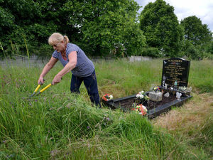 Supporting image for story: Graveyard so overgrown mourners taking their own shears