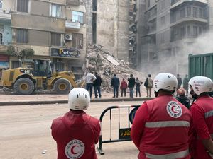 Supporting image for story: At least eight people dead as building collapses in Cairo