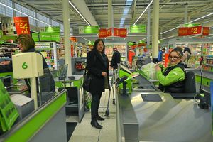 Staff get busy serving the first customers on the opening day