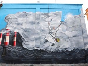 Supporting image for story: Super Pope street artist gets new stamp of Vatican approval