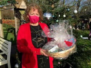 Supporting image for story: Lottery winners team up to deliver Christmas hampers to carers