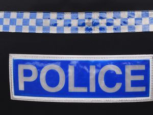 A stock image of a police logo