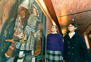 Eleanor Broughton shows Jolie Mao some of the school artwork at Ellesmere College 