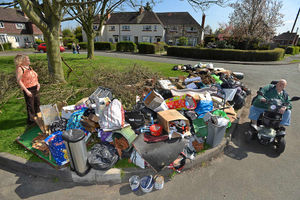 Supporting image for story: Outrage as bags of rotting food dumped on traffic island in protest