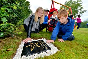 Jack’s family admire the plaque
