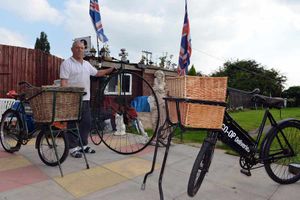 Jake Pearson with a penny farthing from the 1880s and two 1930s delivery bikes.