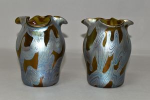 Bought for €8 at a car boot sale in Spain, the pair of Loetz vases have an auction estimate of £800 to £1,200.