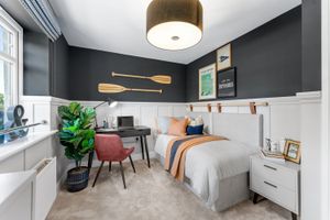 A rowing themed bedroom gives a nod to the local area
