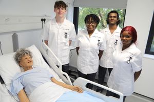 With their new Telford College uniforms, are from left, Callum McCarthy, Stephany Ansah Jacob, Joel Sanjeev and Lilian Gyamfi.