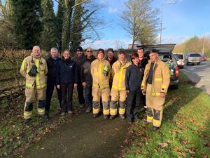 Members of Shropshire Fire & Rescue Service and the RSPCA at Simpsons Pool in Telford. Photo: SFRS
